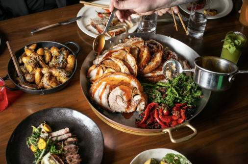 porchetta being served on table