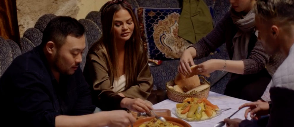 david chang and chrissy teigen enjoy a meal