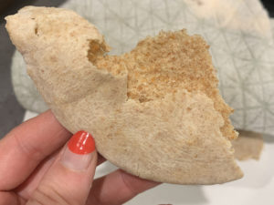 flatbread torn in hand