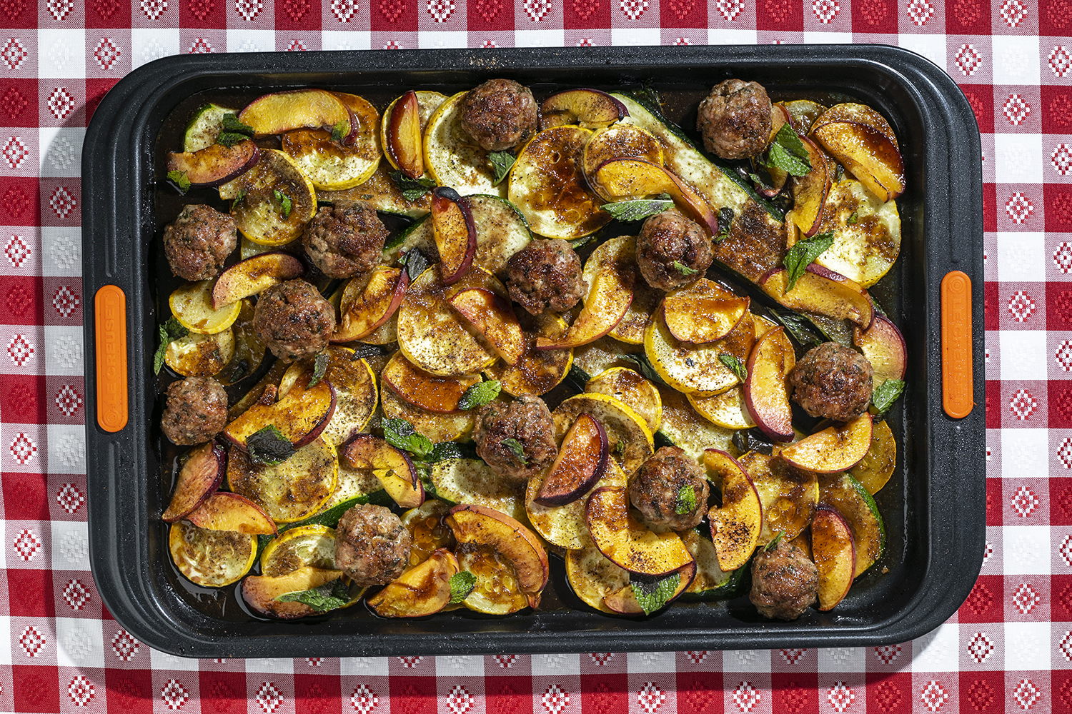 Sheet Pan Tingly Meatballs with Charred Peaches and Summer Squash